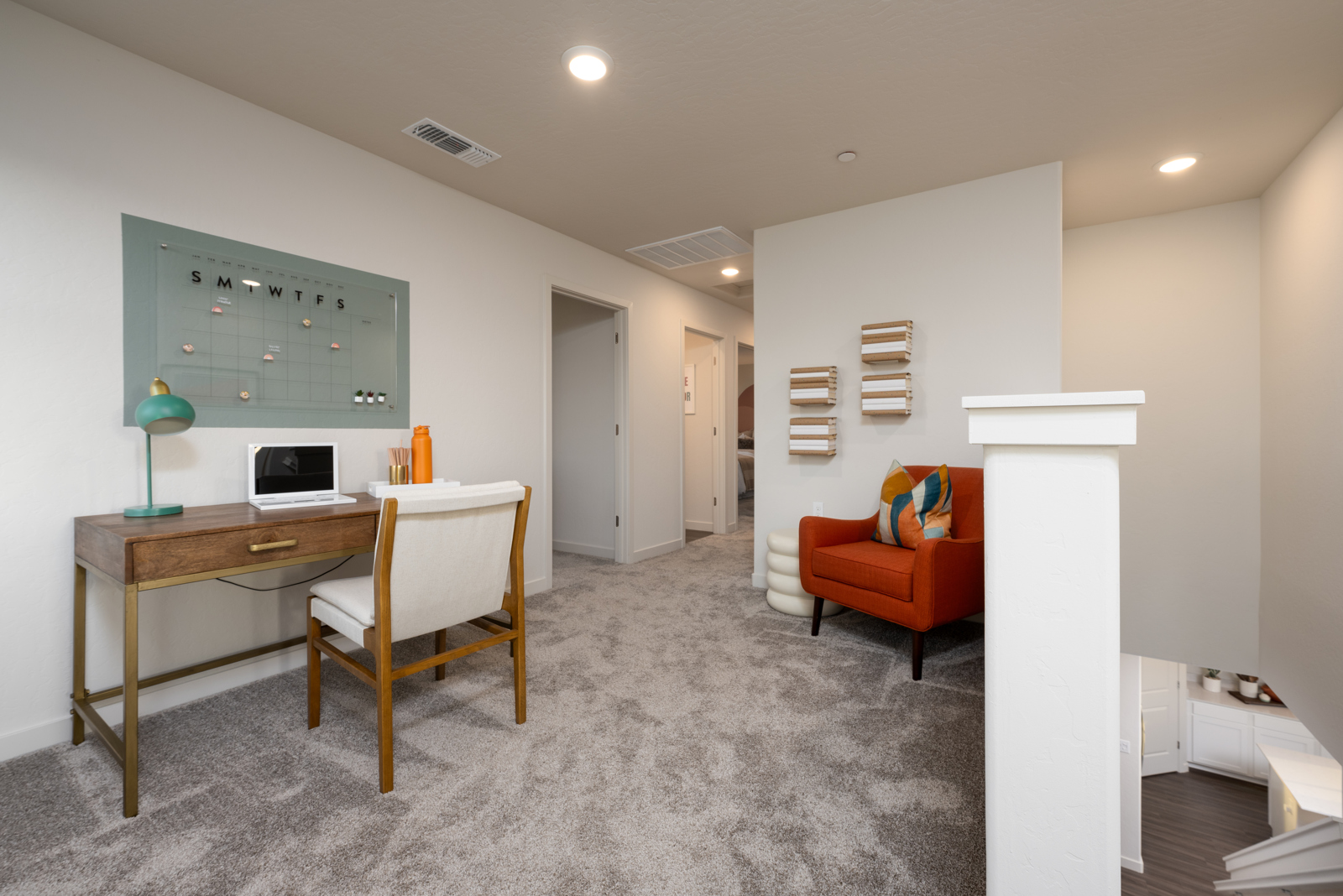 A room with a desk and chair.