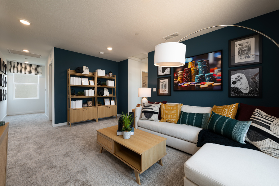 A living room with a couch and a coffee table.