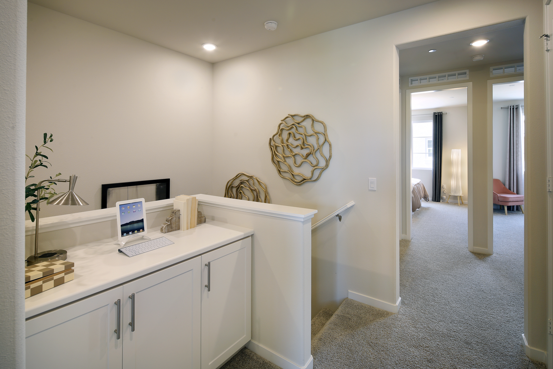 A room with a desk and a computer.