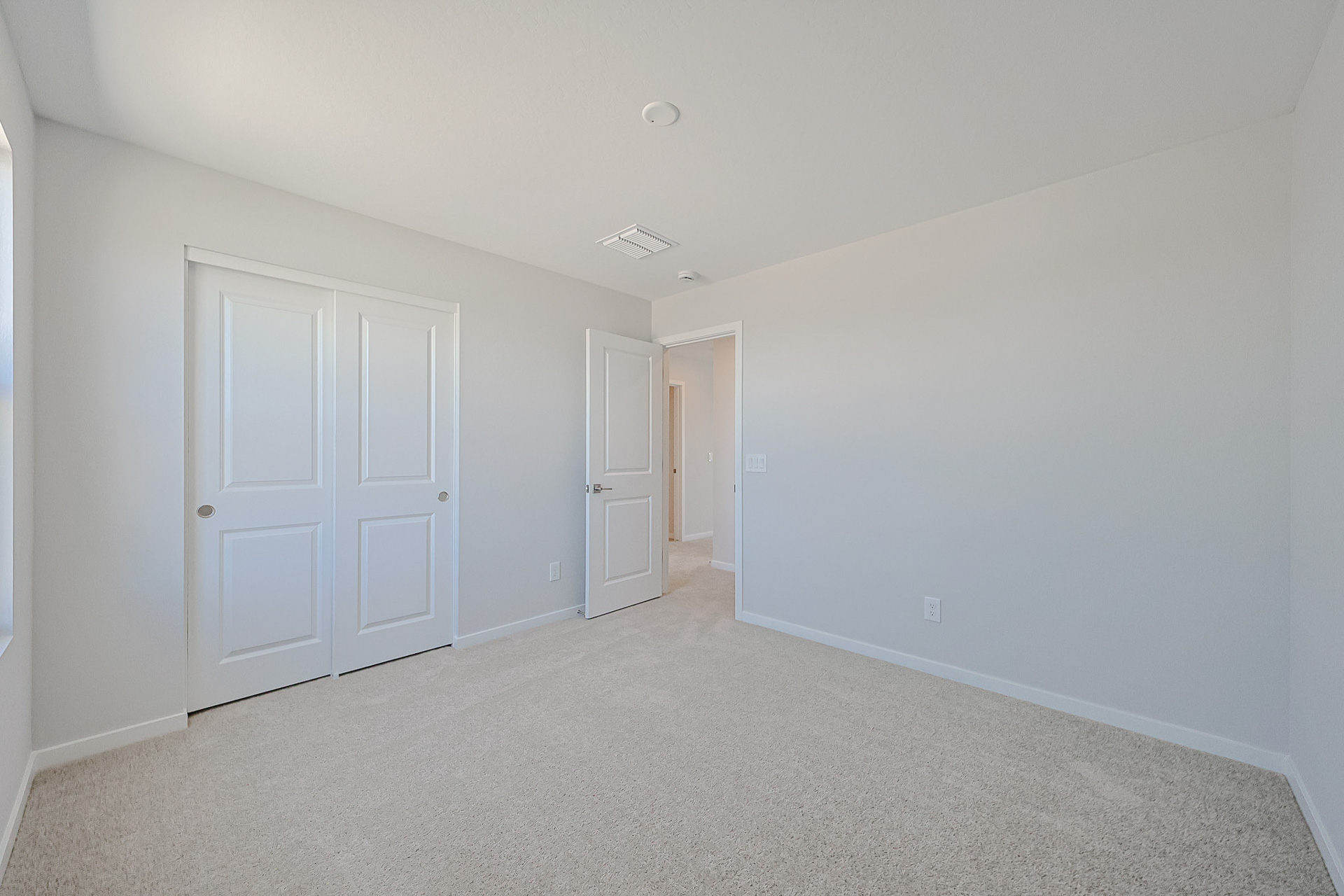 A room with white doors.