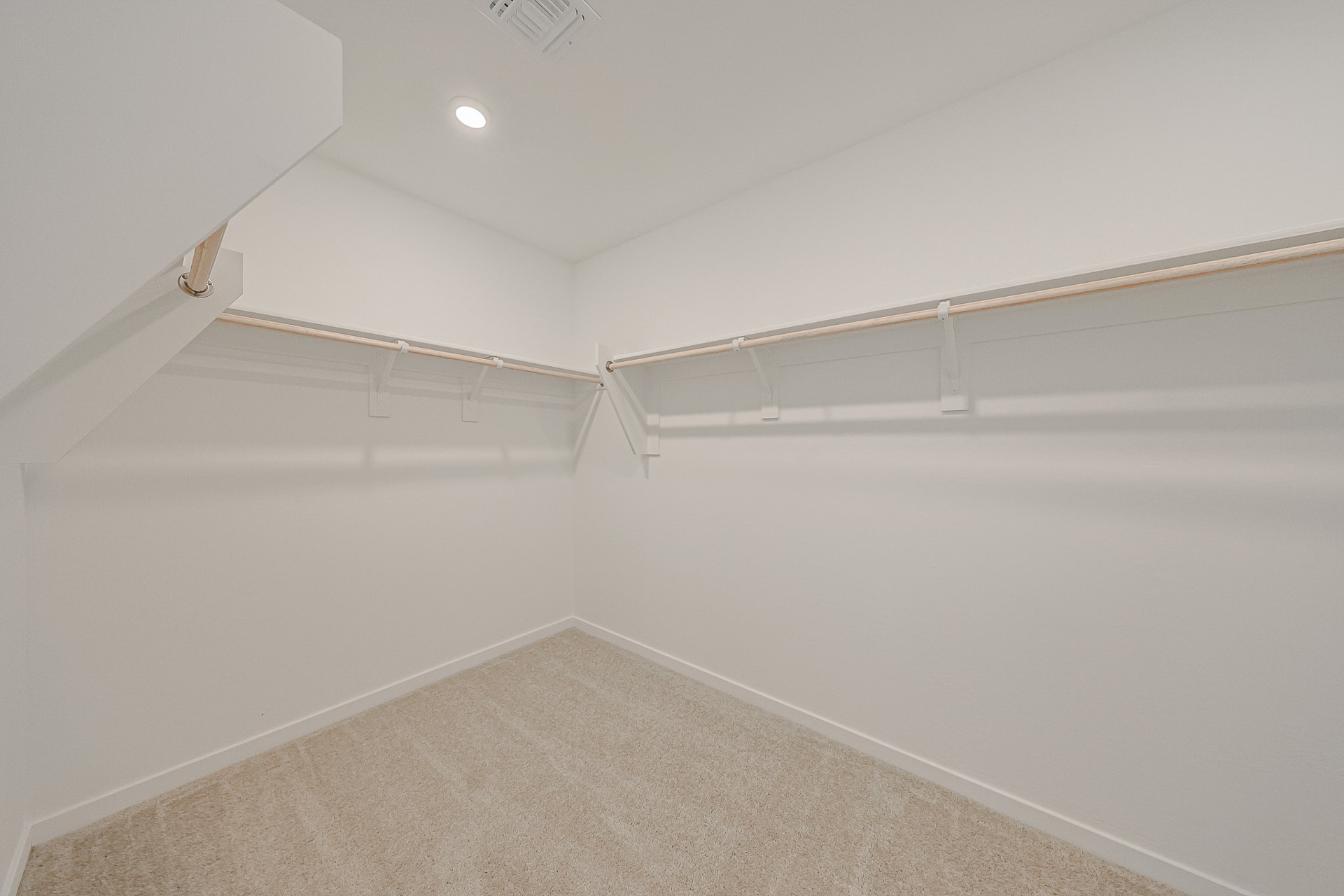 A white wall with a light.