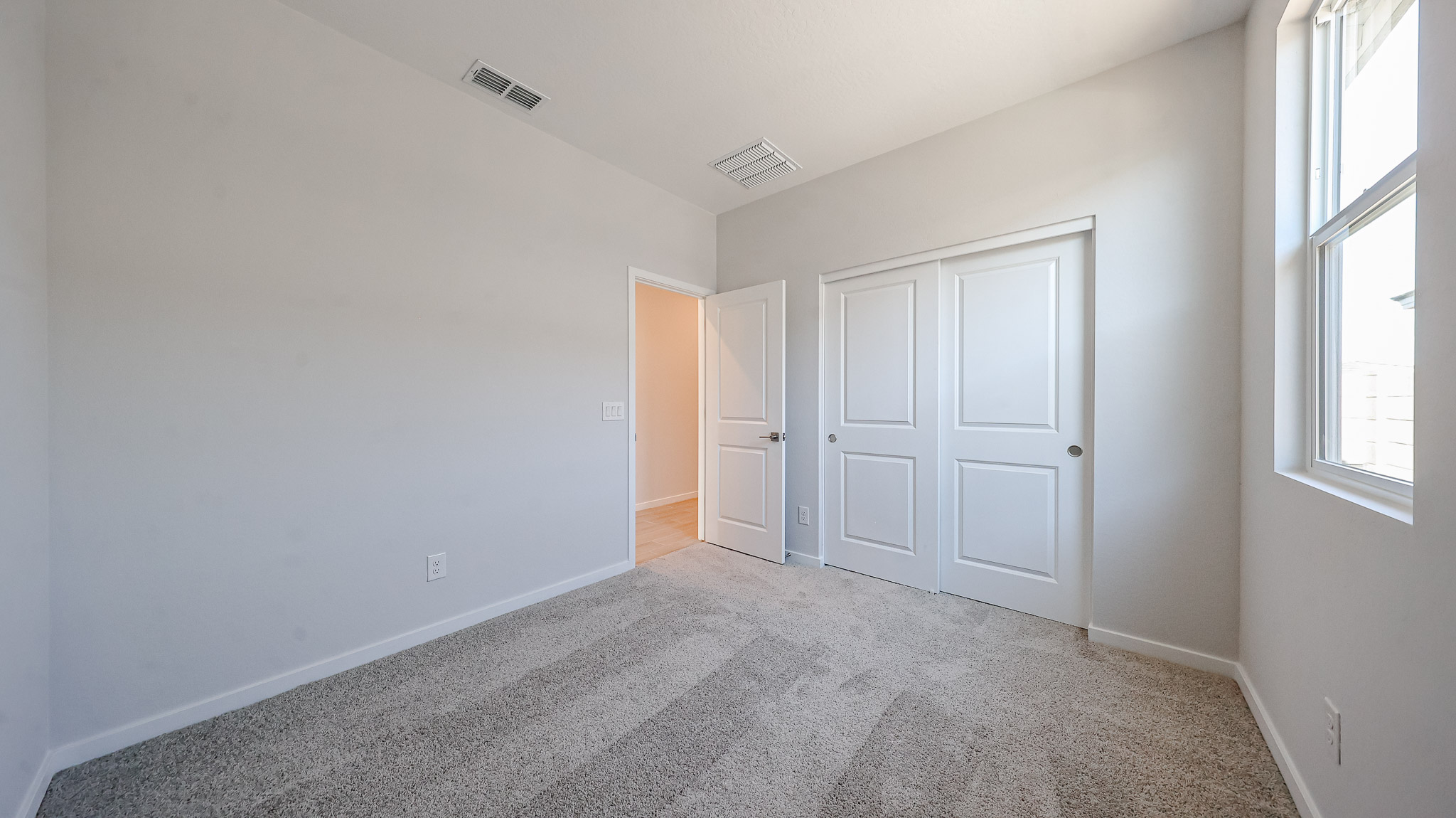 A room with white doors.