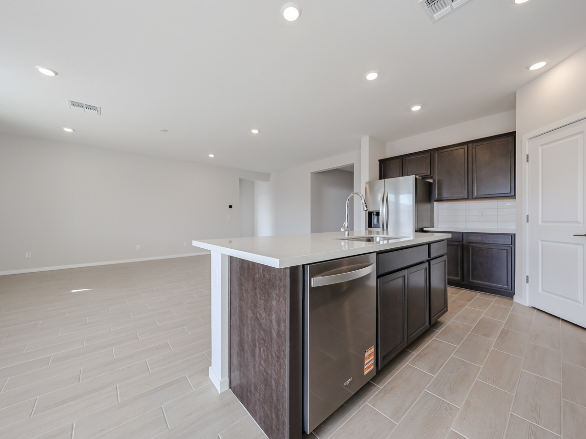 A kitchen with stainless steel appliances.