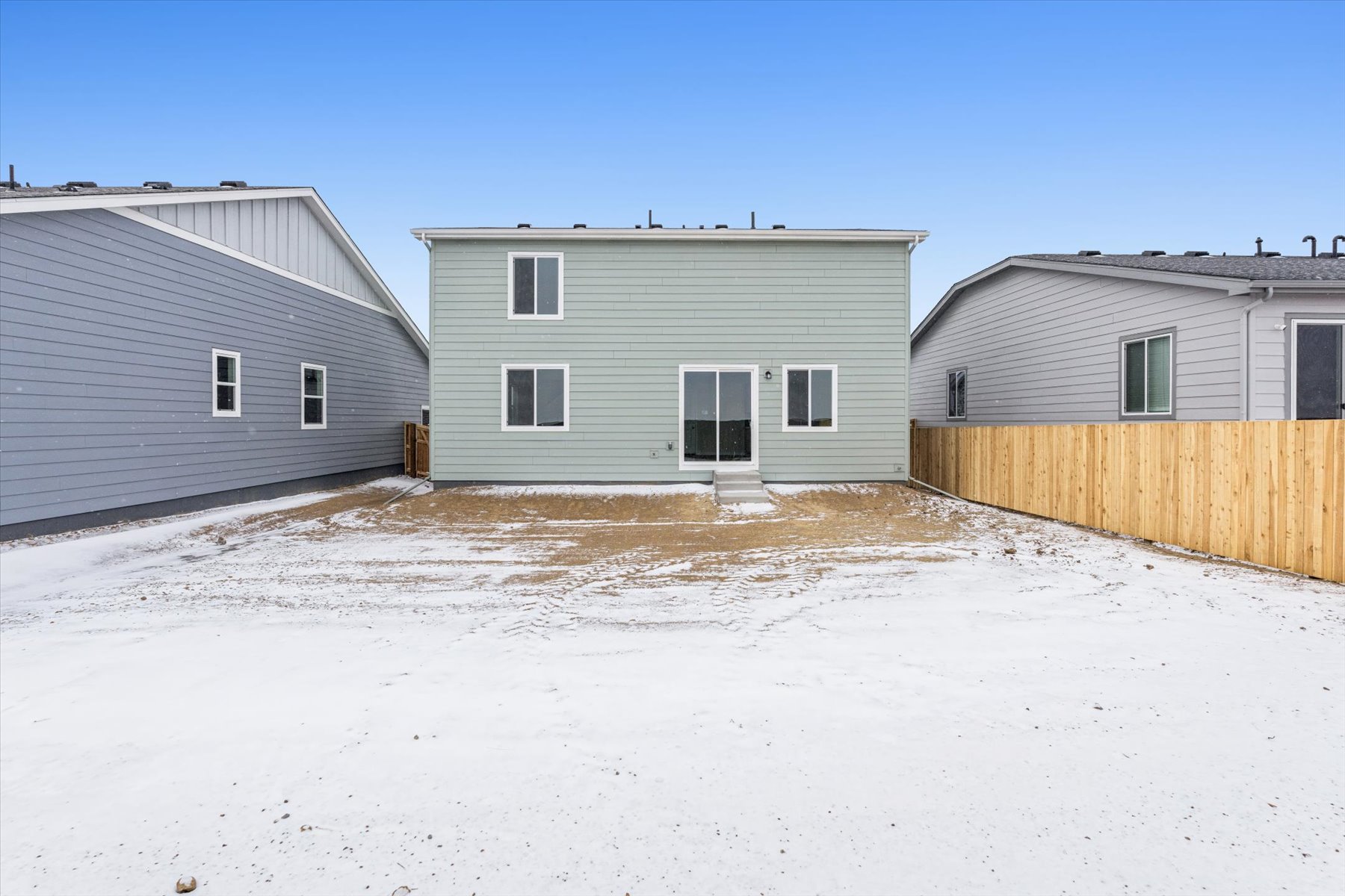 A group of buildings in a snowy area.