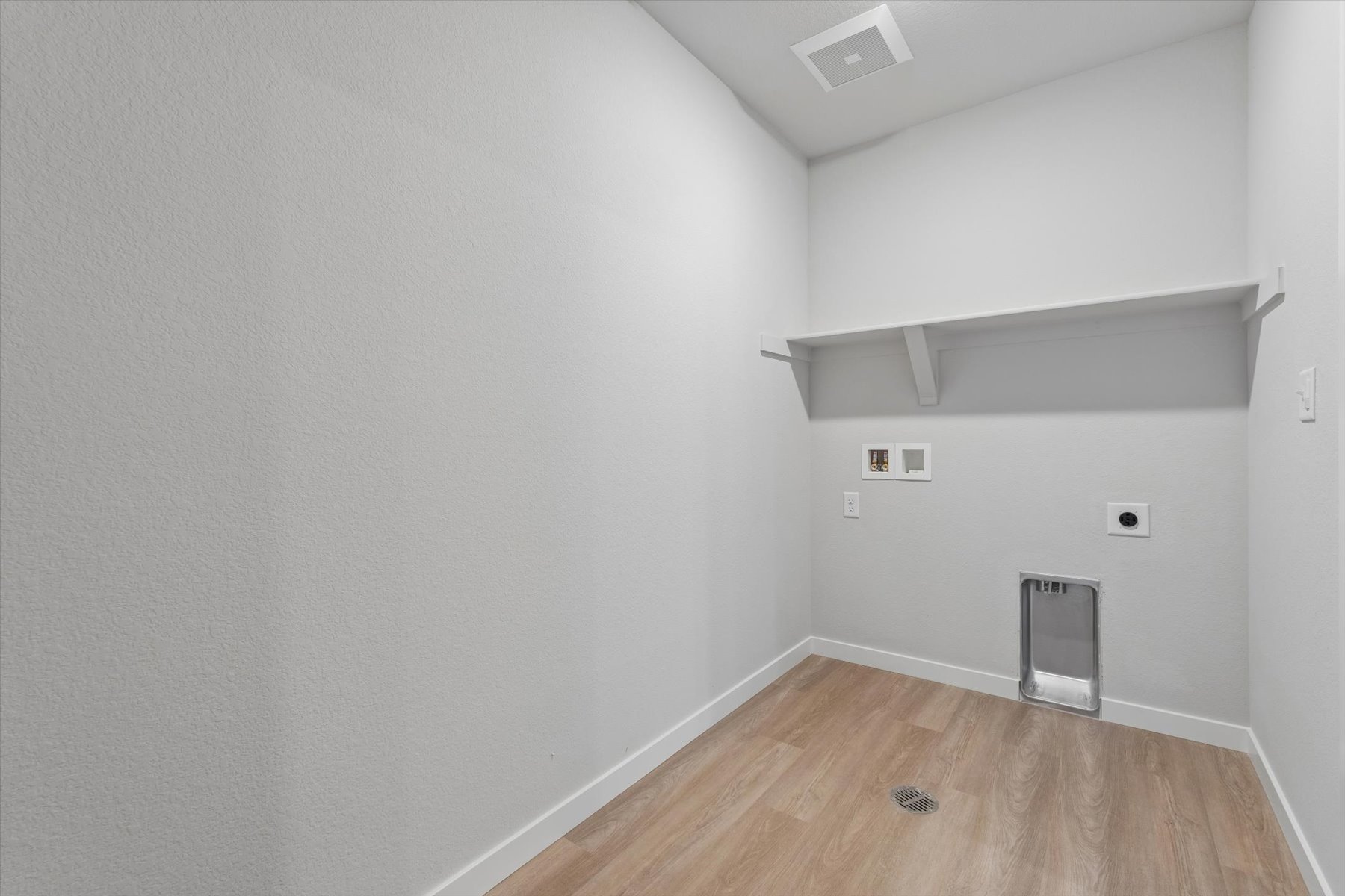 A room with white walls.