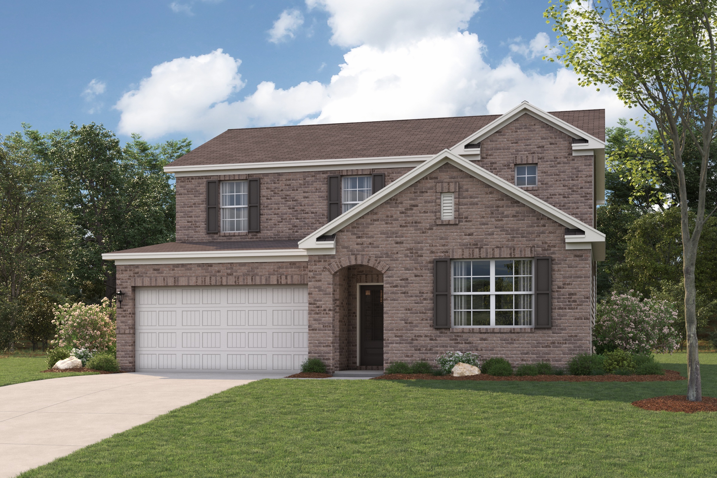 A brick house with a garage.