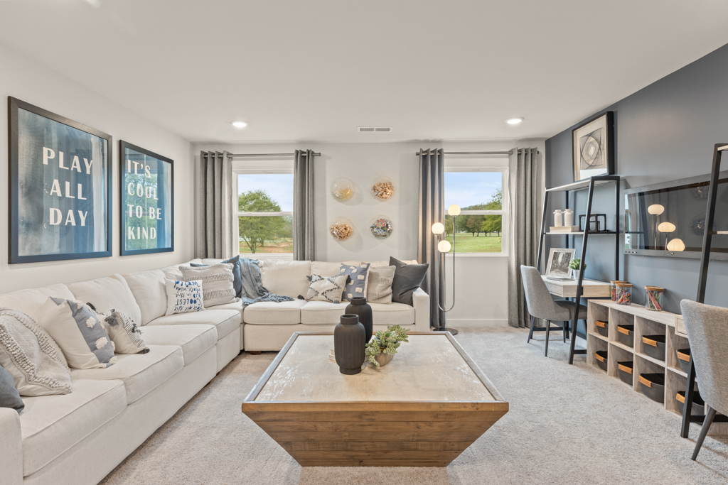 A living room with a large glass door.