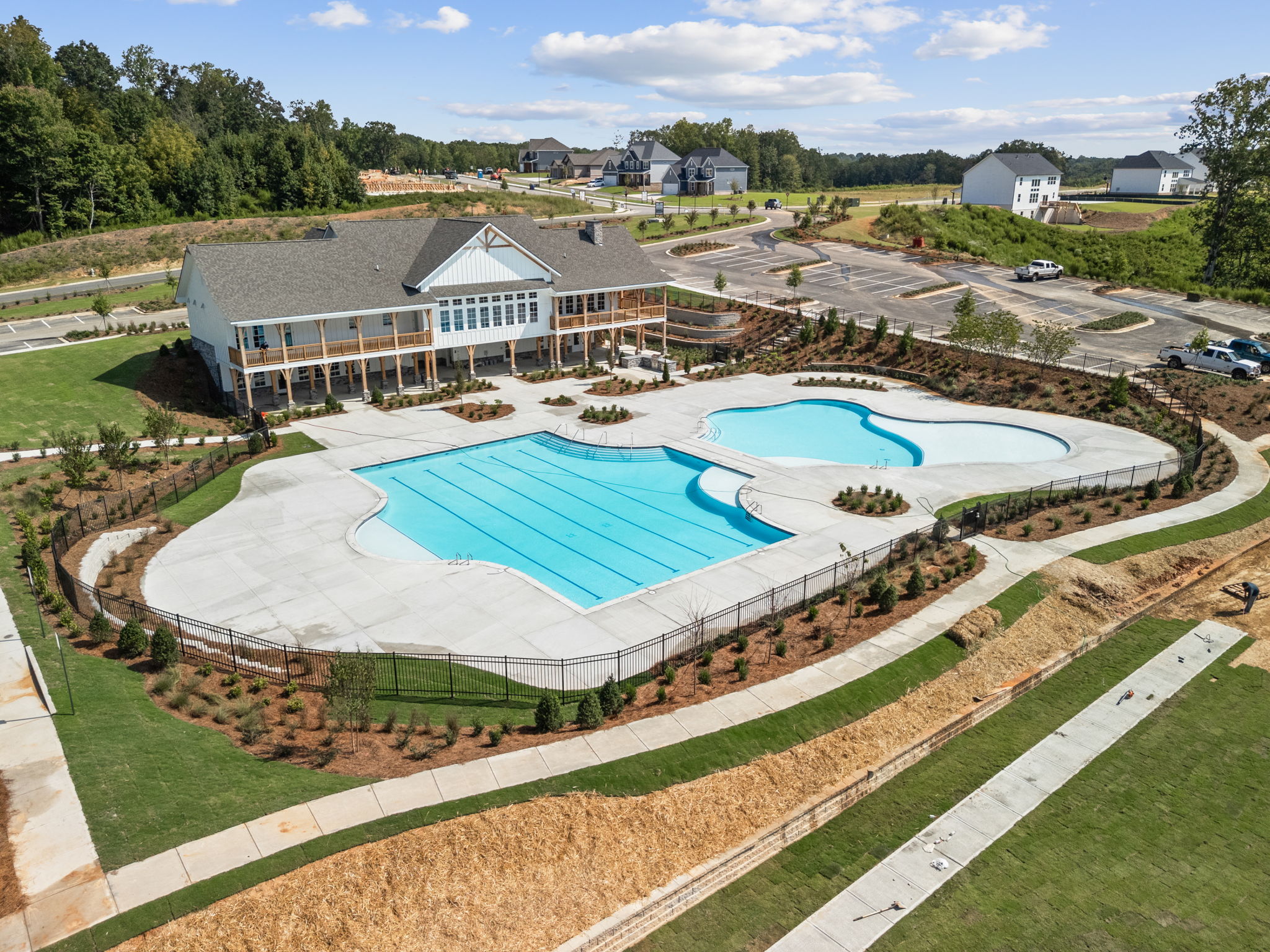 A swimming pool in a backyard.