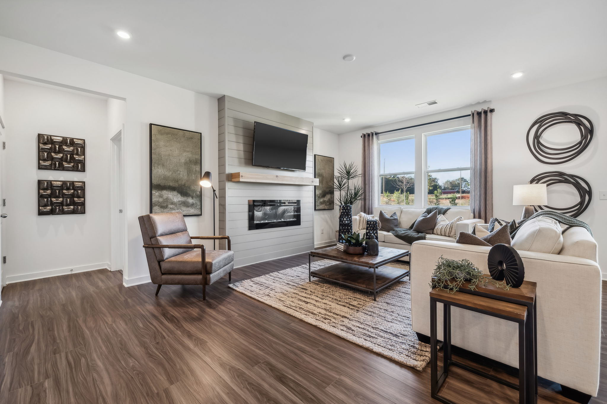 A living room with a fireplace.