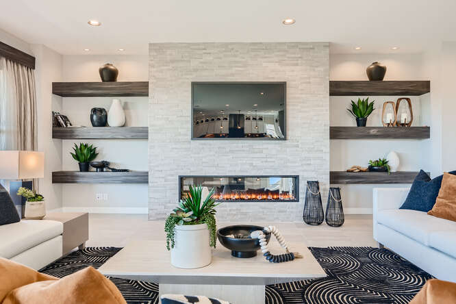 A living room with a fireplace.