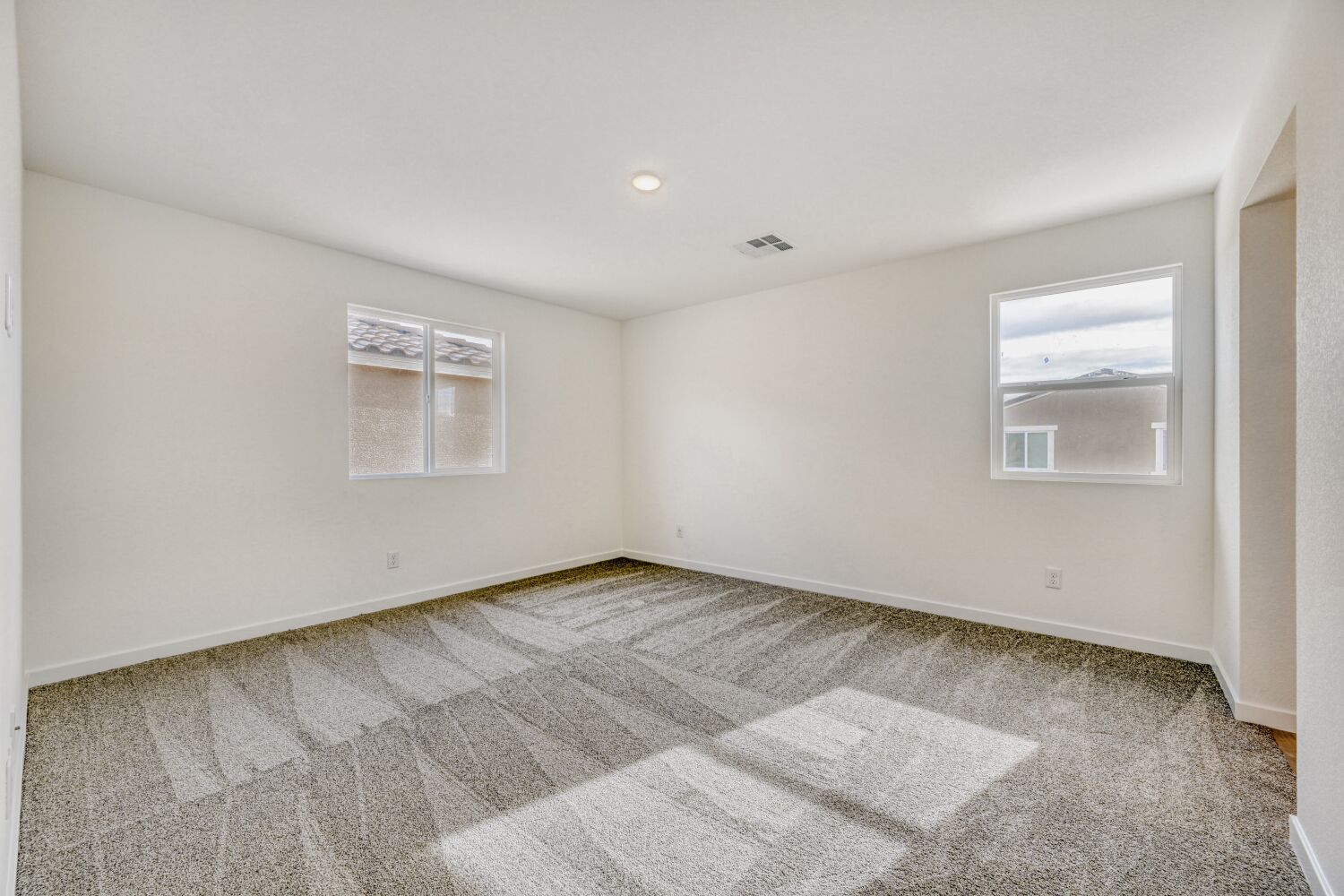 A room with a rug and a rug.