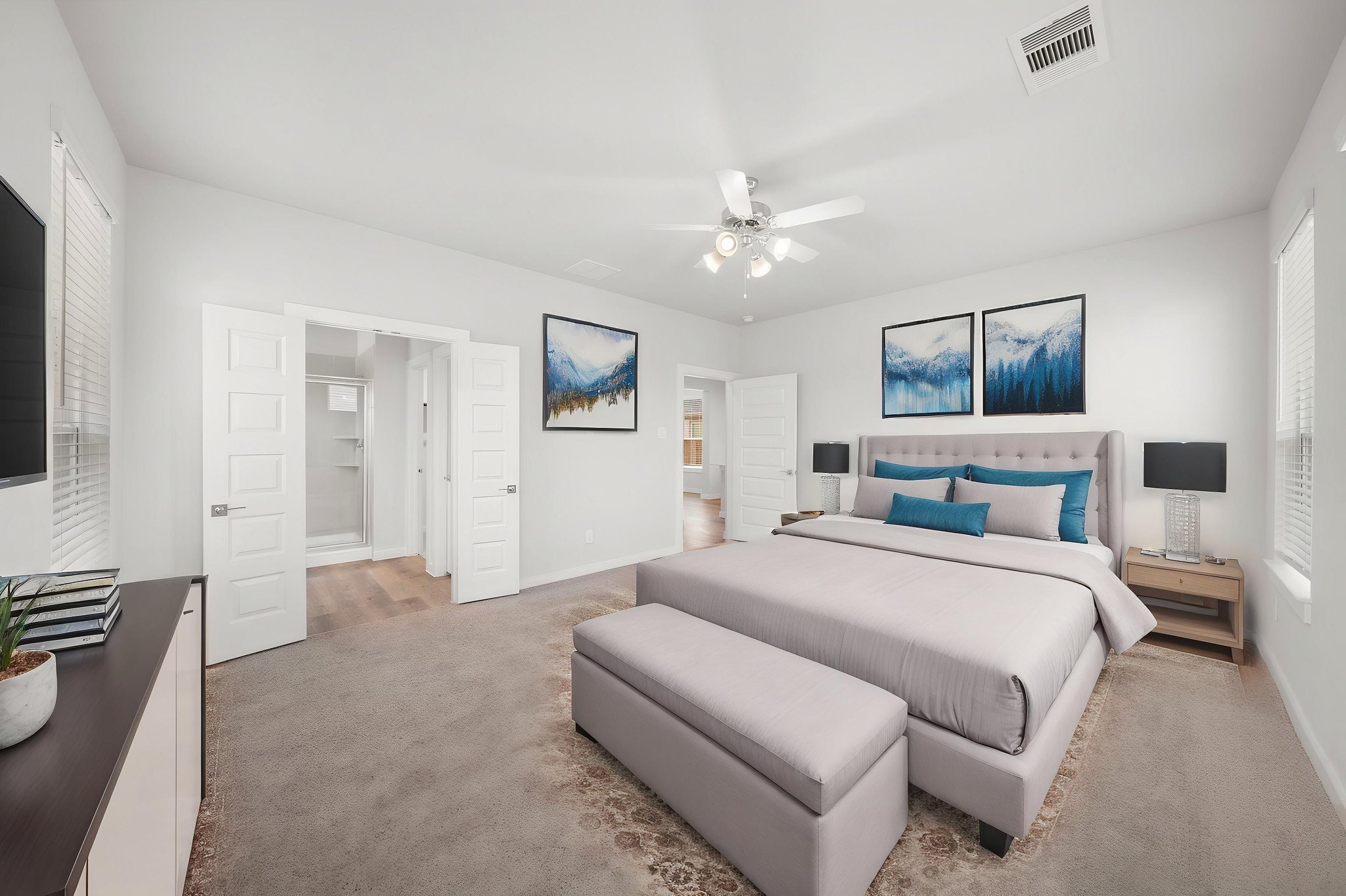 A room with a couch and a table.