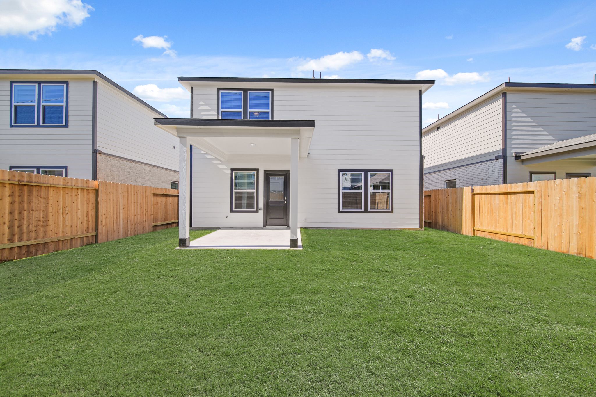 A house with a fence around it.