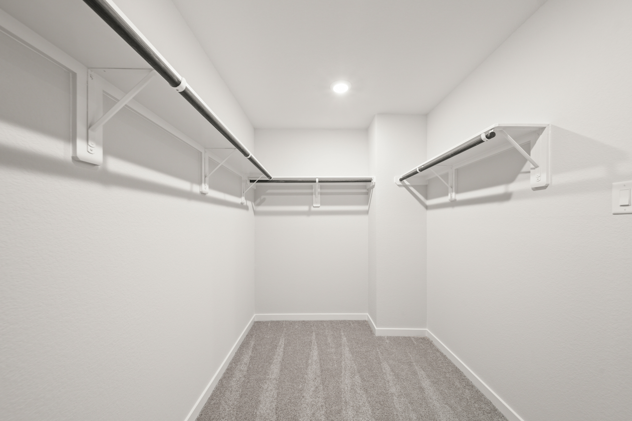 A white hallway with white walls.