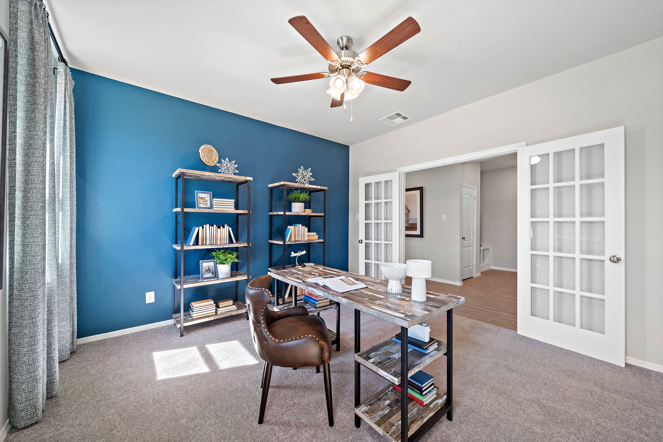 A room with a table and chairs.