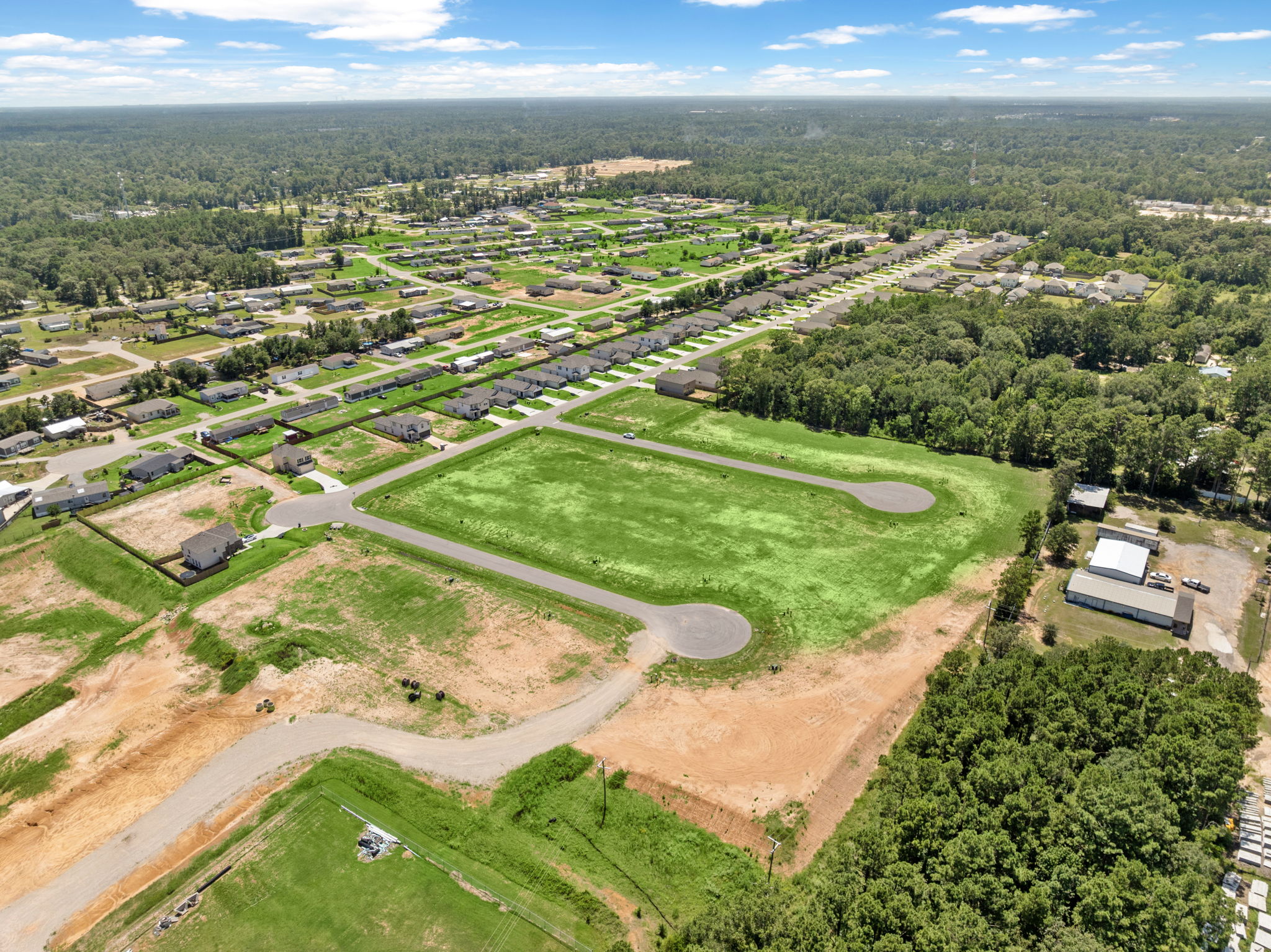 A landscape with trees and buildings.