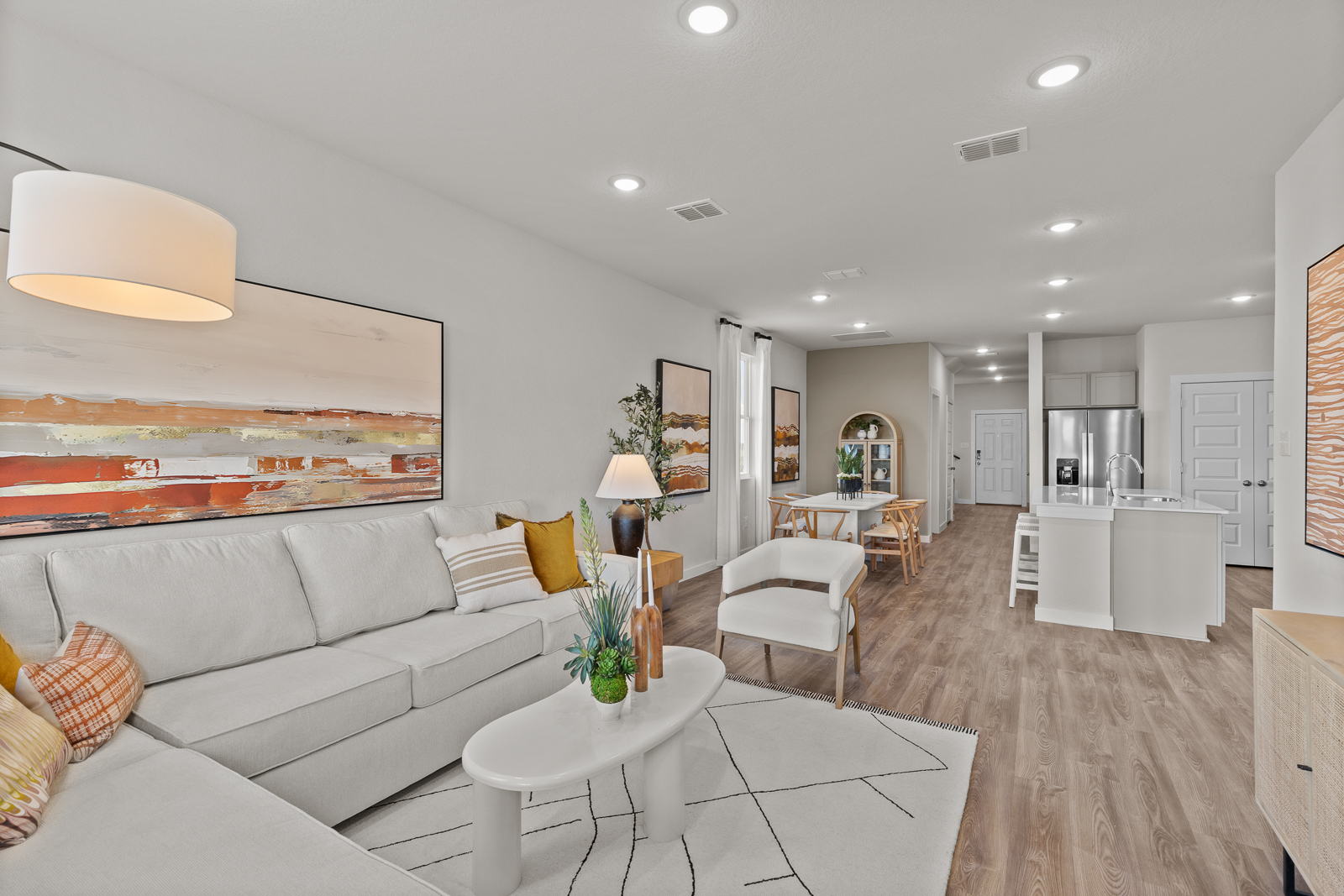 A living room with a couch and a table.