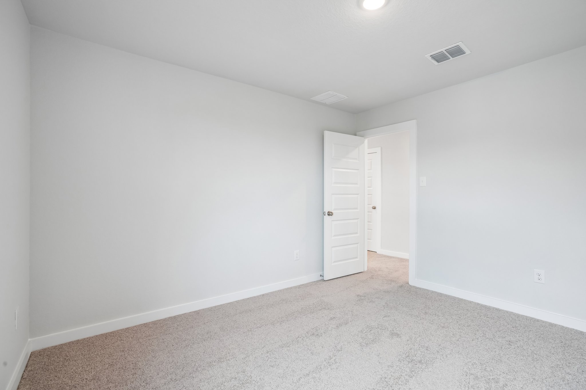 A room with white doors.