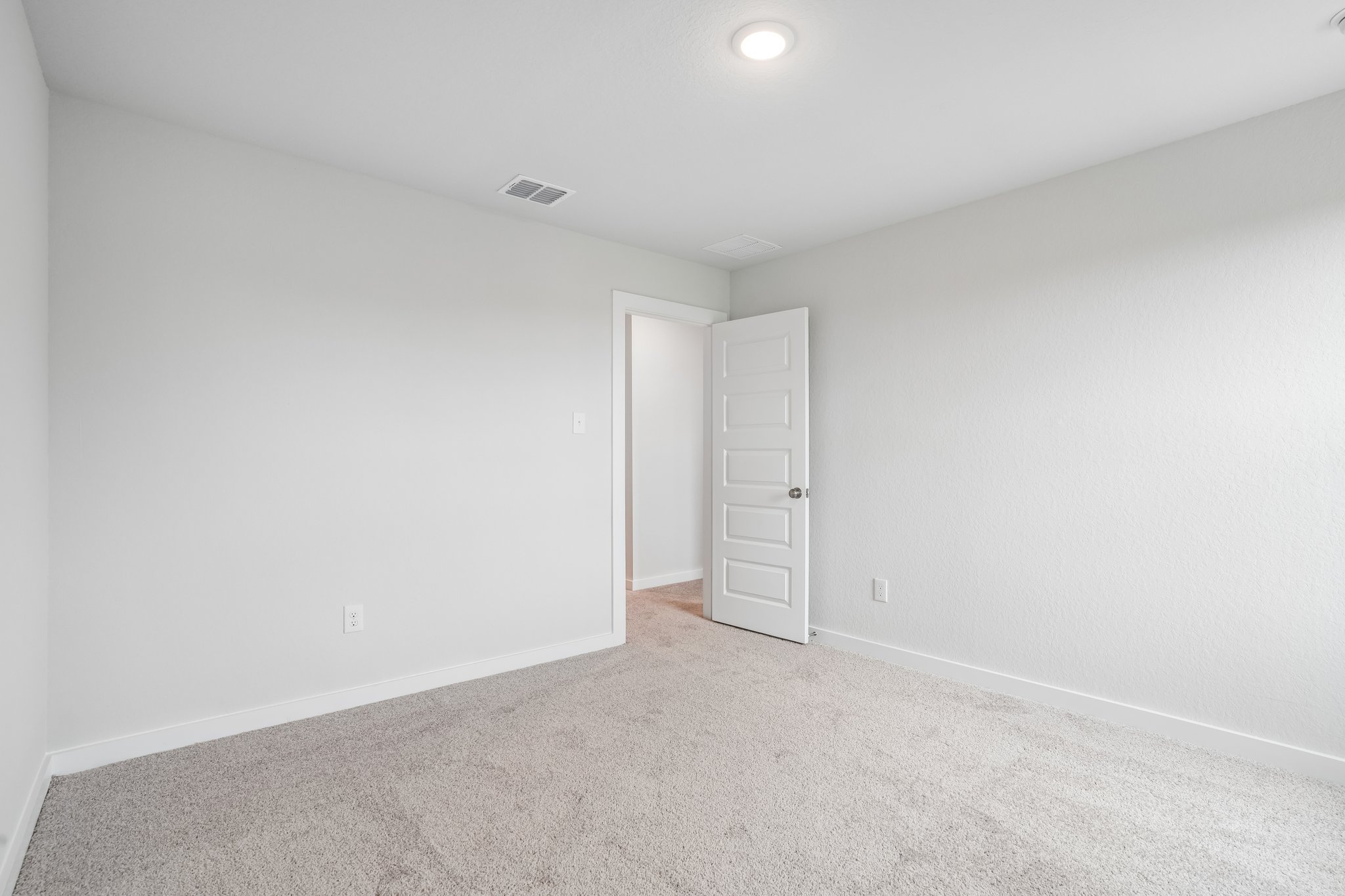 A room with white walls.