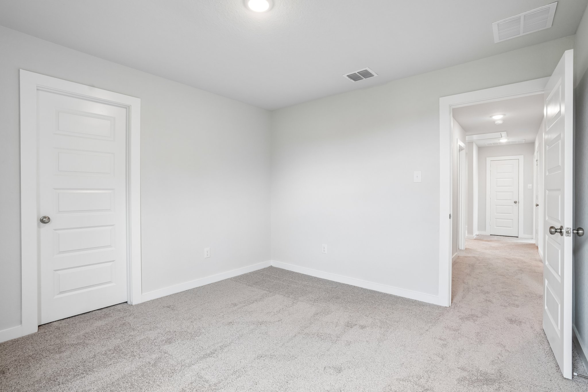 A room with white doors.