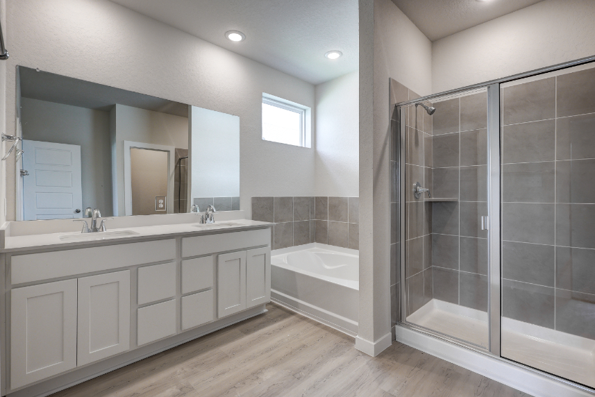 A bathroom with a glass shower.