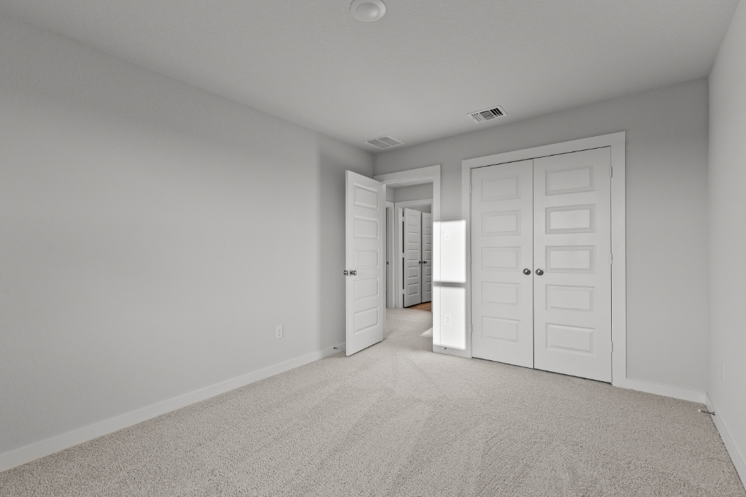 A room with white doors.