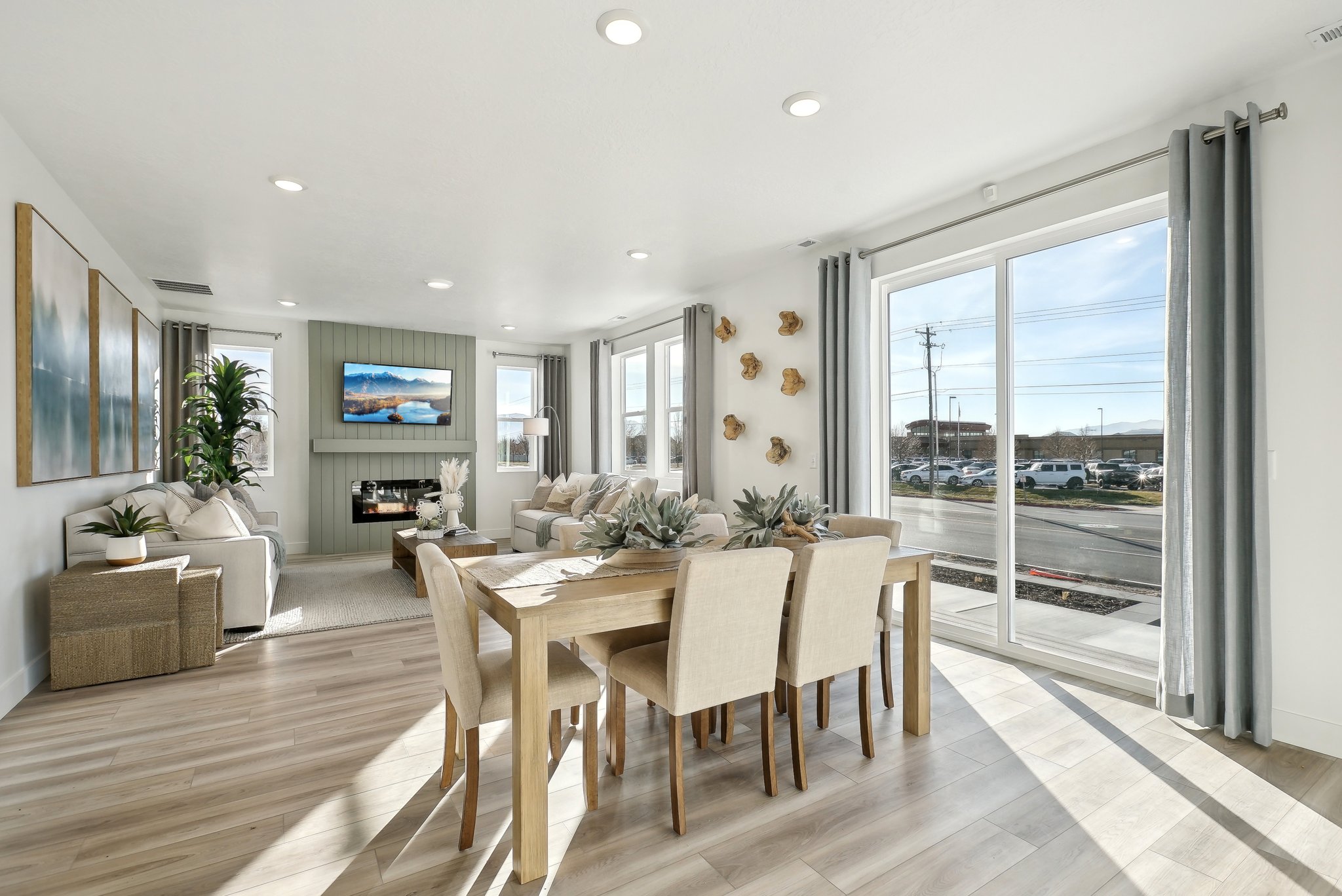 A dining room with a large window.