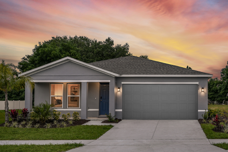 A house with a garage and a driveway.