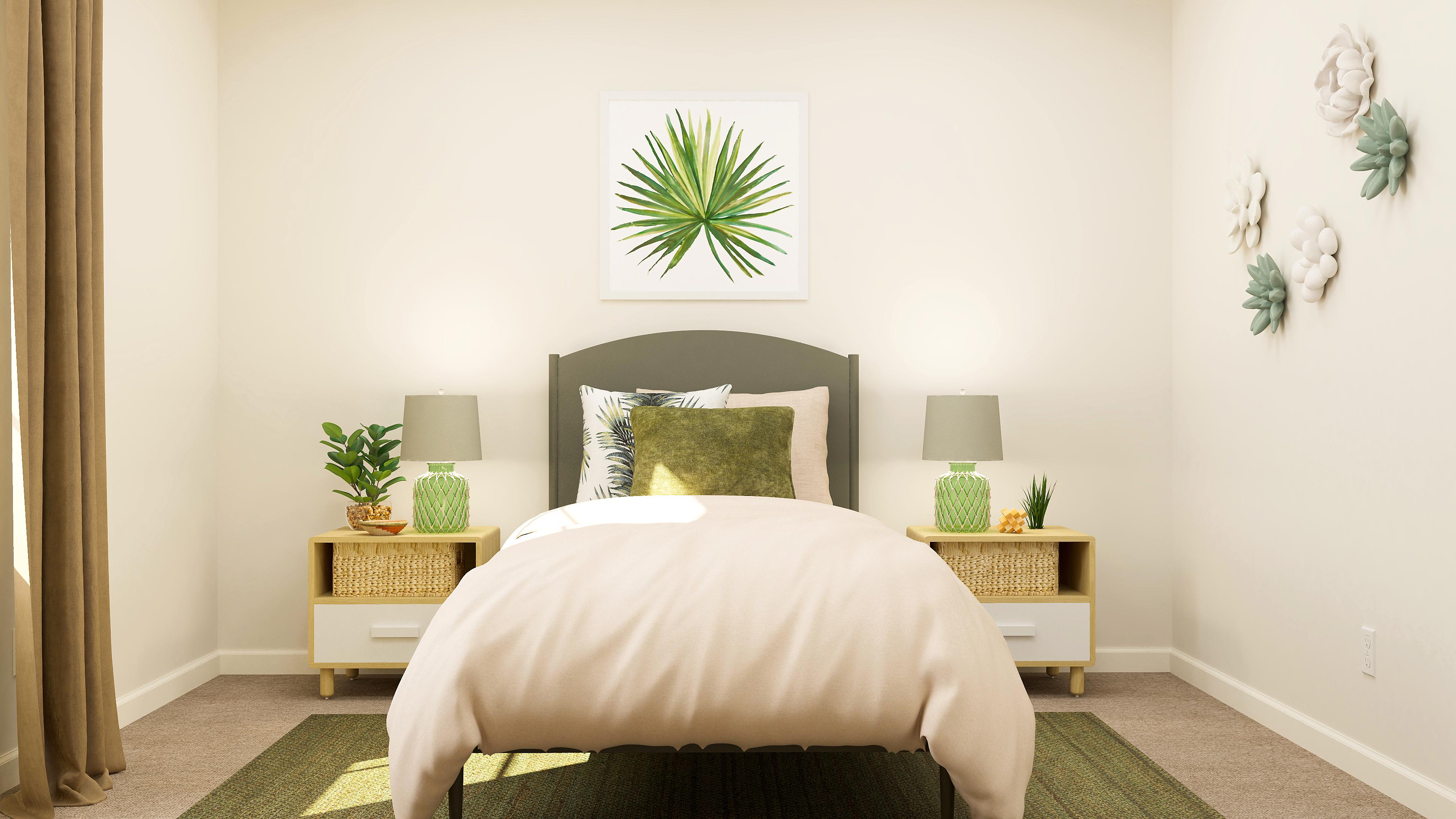 A bedroom with a bed and lamps.