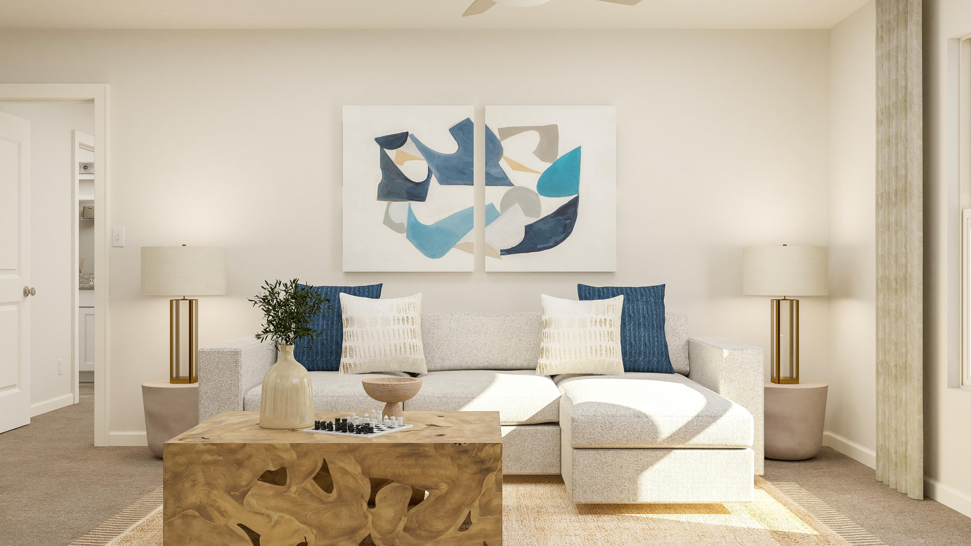 A living room with a couch and a coffee table.