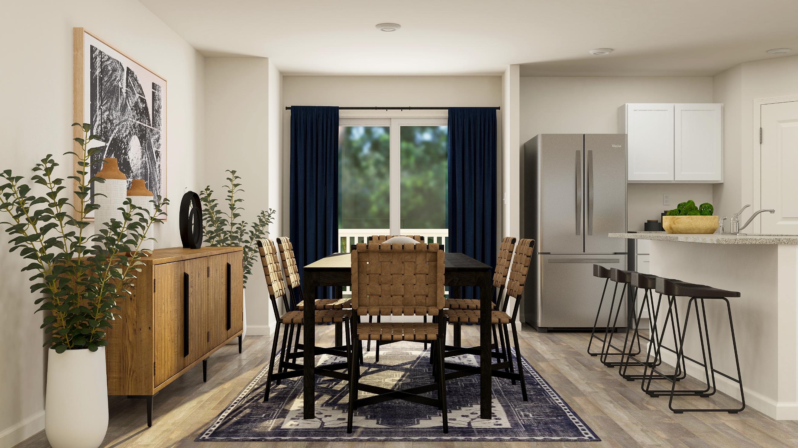 A kitchen with a dining table and chairs.