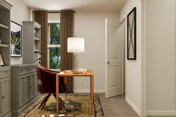 A room with a table and a lamp.